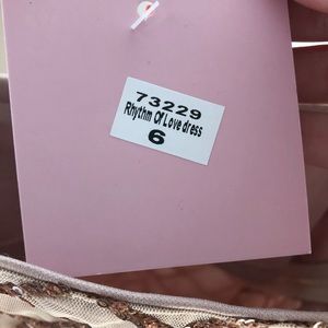 rhythm of love dress in rose gold